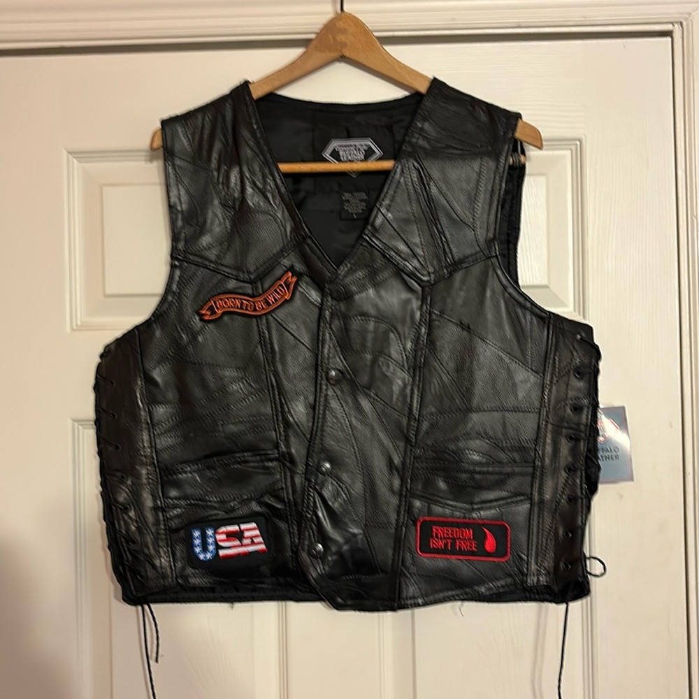 Leather riding vest.New with tags. Never worn.